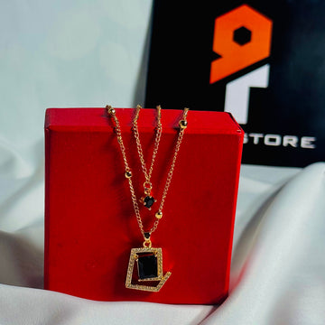 Golden Pendant Necklace With Black Stone & Crystal Accents