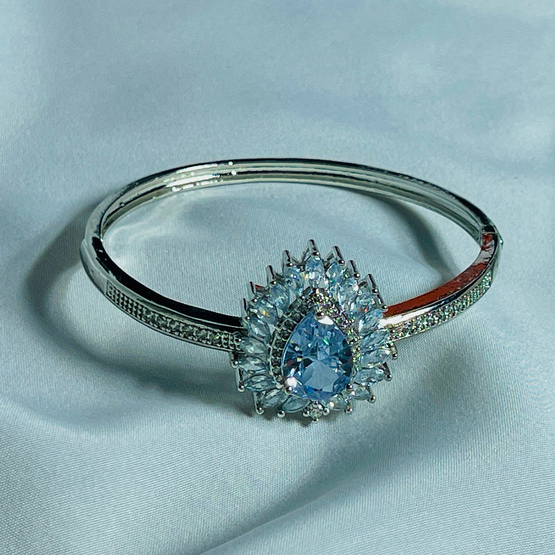 Silver Bangle With Icy Blue Stone